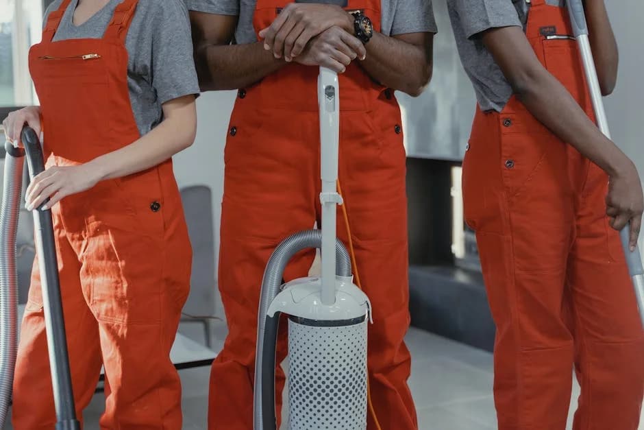 Professional janitorial team cleaning a commercial business facility