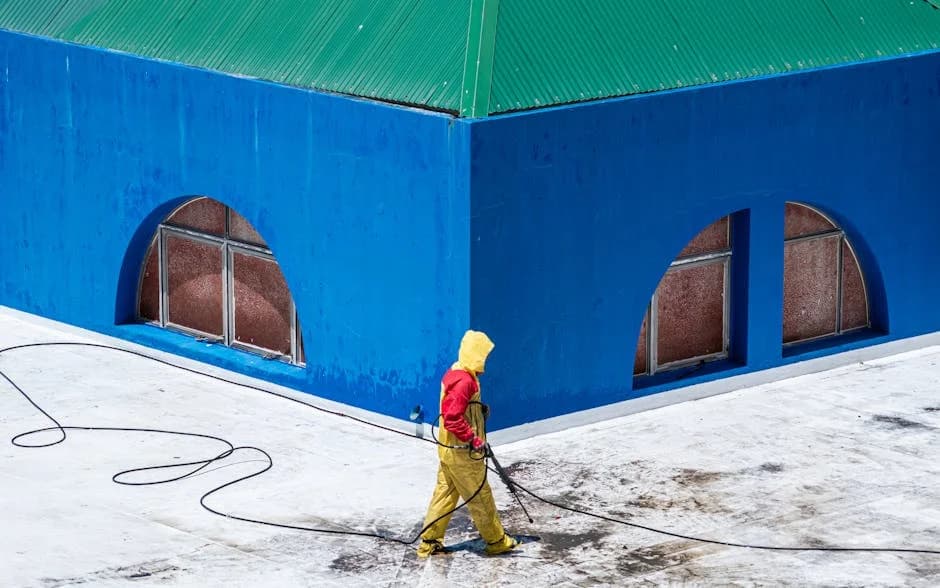 Commercial pressure washing of a Florida building exterior and parking lot
