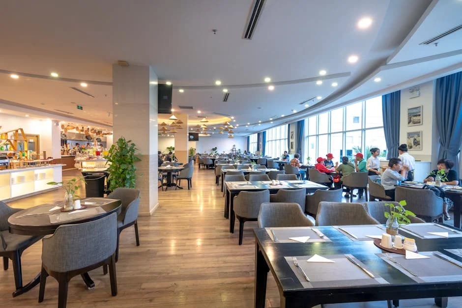 Professional restaurant cleaning team cleaning a commercial kitchen