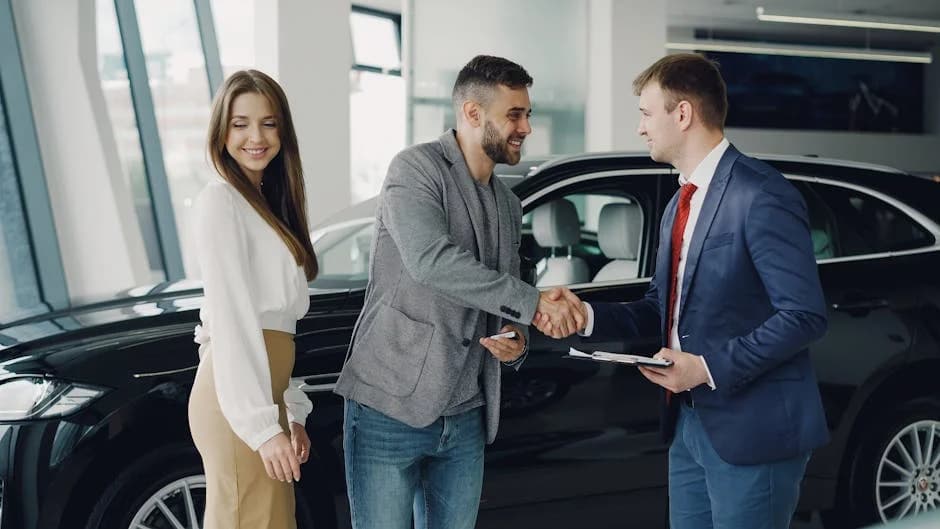 Auto dealership showroom with gleaming floors and clean vehicle displays