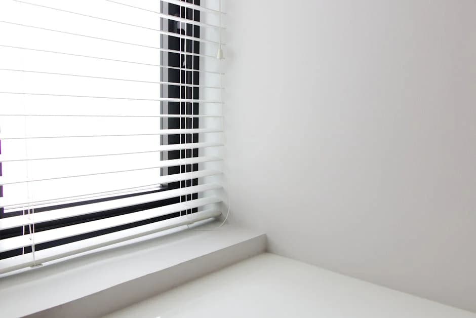 Office window blinds being professionally cleaned