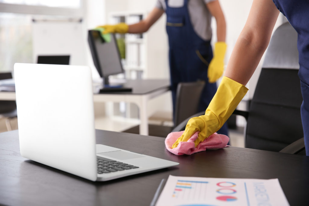 Janitor wiping table